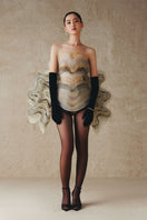 Mini mesh fabric dress with embroidered curves by Phan Huy, featuring a fitted silhouette and stylish detailing.