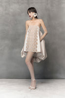 Off-shoulder teardrop mini dress by Phan Huy, featuring a fitted silhouette and stylish neckline, perfect for casual or semi-formal wear.
