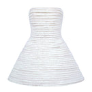 White mini tulle dress with metal beads by Phan Huy, front view showcasing delicate fabric and beaded embellishments.