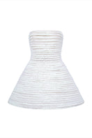 White mini tulle dress with metal beads by Phan Huy, front view showcasing delicate fabric and beaded embellishments.