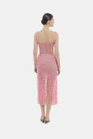 Pink beaded lace pencil gown by Montsand, featuring a fitted silhouette and intricate lace detailing, perfect for elegant occasions.