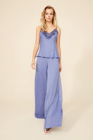 Bocan Couture Willow silky cami and high-waisted lilac pajama set displayed on a model, featuring smooth fabric and comfortable fit.