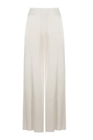 Bocan Couture Paige cami and high-waisted off-white pajama set featuring a silky camisole and matching relaxed pants.
