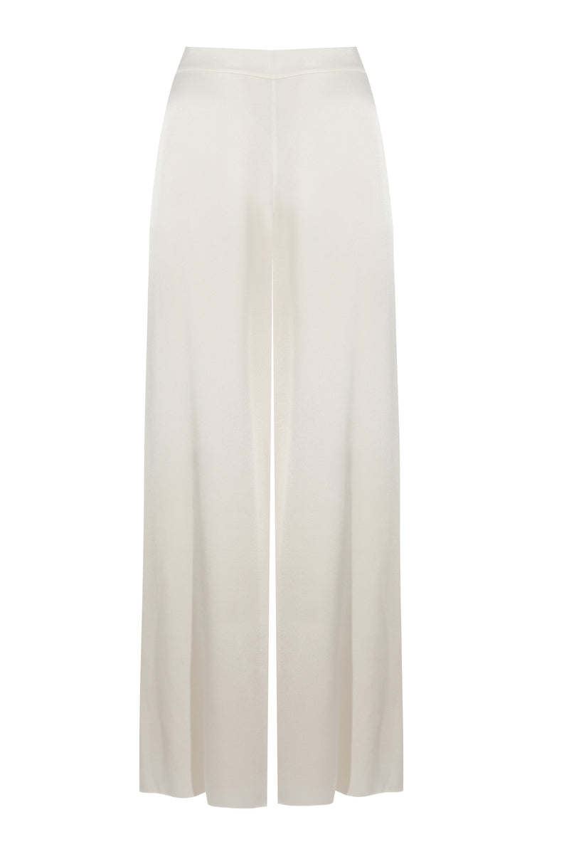 Bocan Couture Paige cami and high-waisted off-white pajama set featuring a silky camisole and matching relaxed pants.
