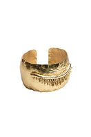Sara & Flora closed eye bracelet featuring a delicate silver design with intricate detailing and a charming, artistic appearance.