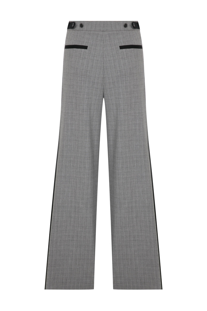 Light beige Tagg pleated wide-leg pants featuring a high waist and flowing fabric, displayed on a neutral background.