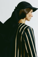 PODYH striped straight jacket from the SS24 lookbook, featuring a stylish, tailored design with bold vertical stripes.