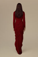 Red Thalora midi gown by POEM, featuring elegant flowy fabric and sophisticated design, perfect for formal occasions.