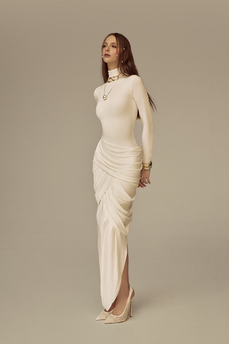 White POEM Thalora midi dress with a flowy silhouette and elegant design, perfect for stylish occasions.
