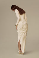 White POEM Thalora midi dress with sleeveless design and flowy fabric, perfect for elegant daytime or evening wear.