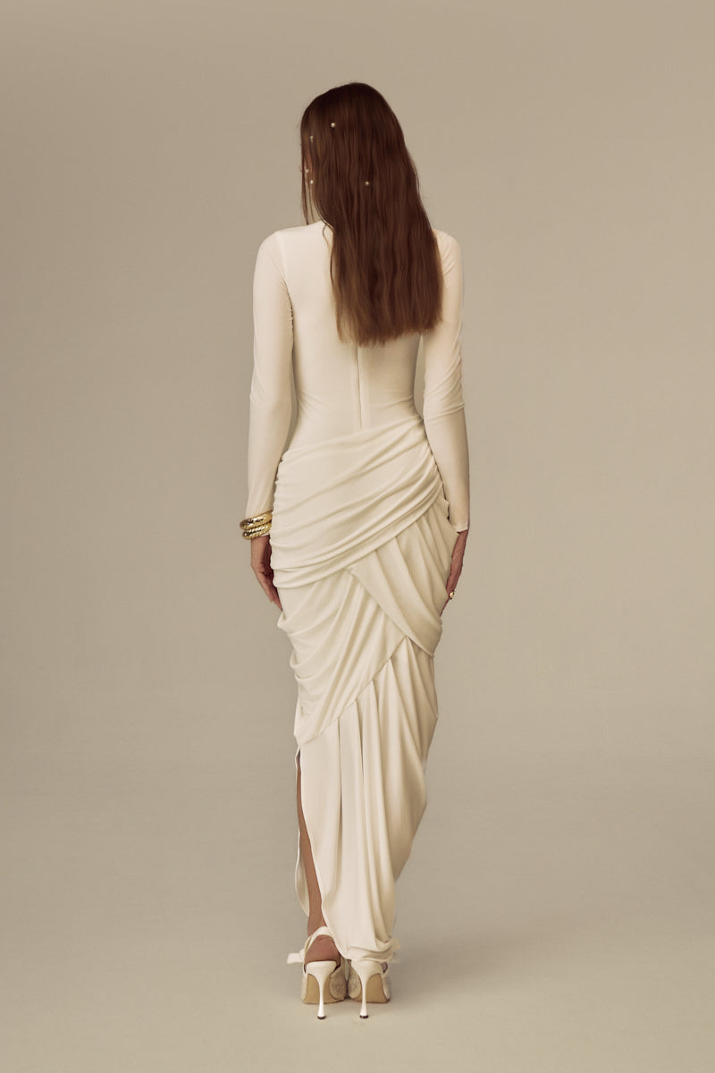 White POEM Thalora midi dress featuring a flowing silhouette and elegant design, perfect for stylish occasions.