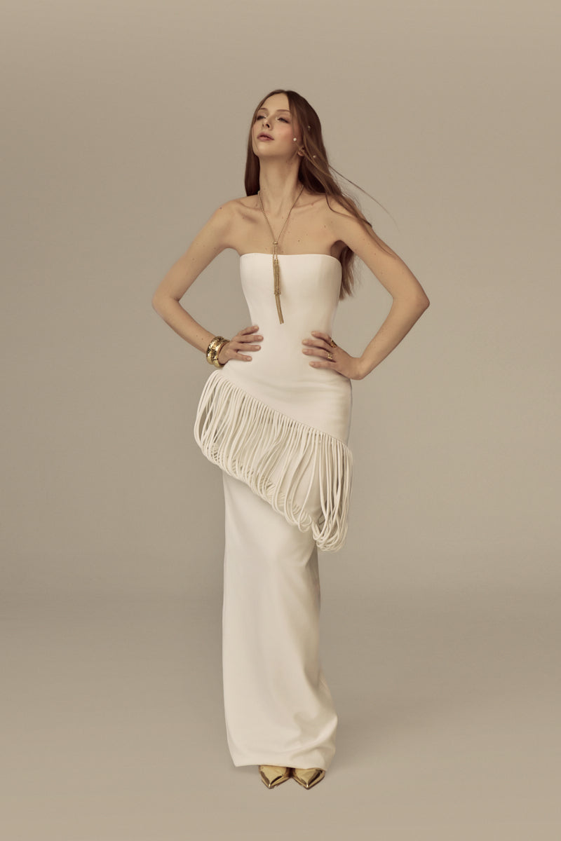 POEM Isolara midi dress featuring a flowing maxi design with a fitted bodice and elegant fabric, perfect for stylish occasions.