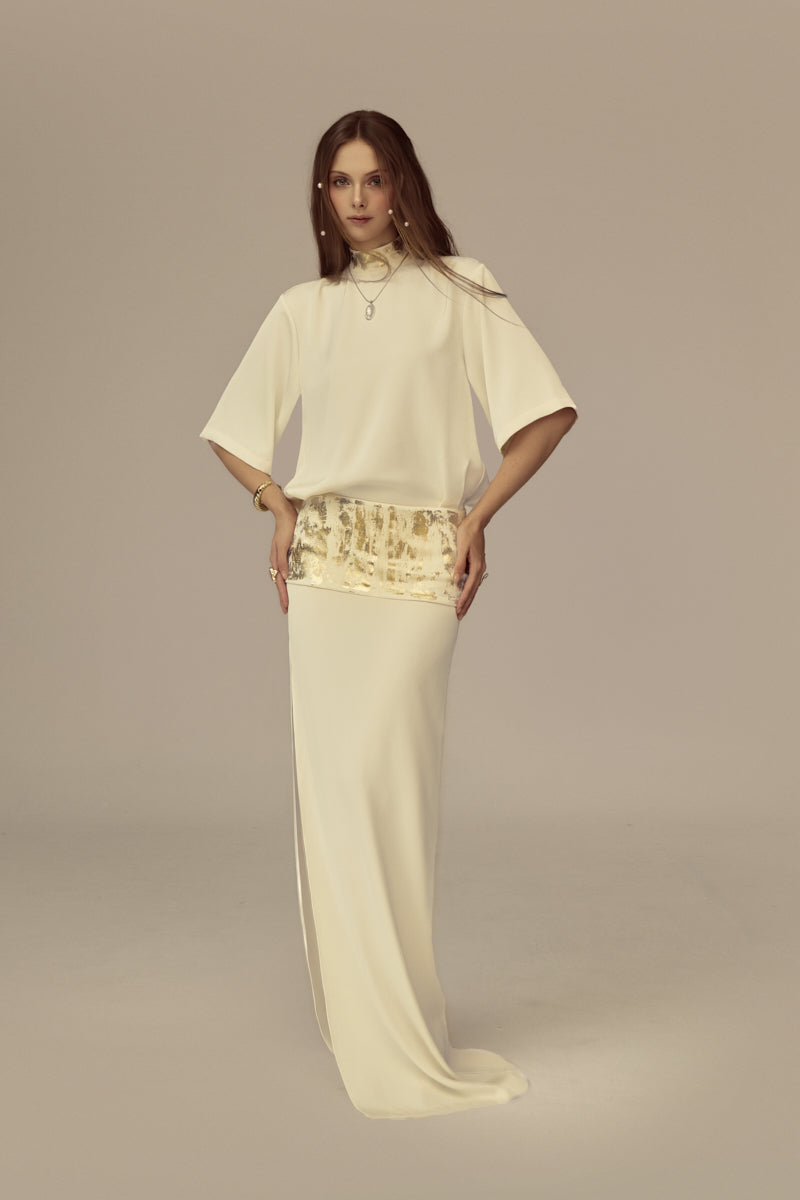 Poem Radiara maxi dress featuring a flowing fabric and elegant design, perfect for dressy occasions.