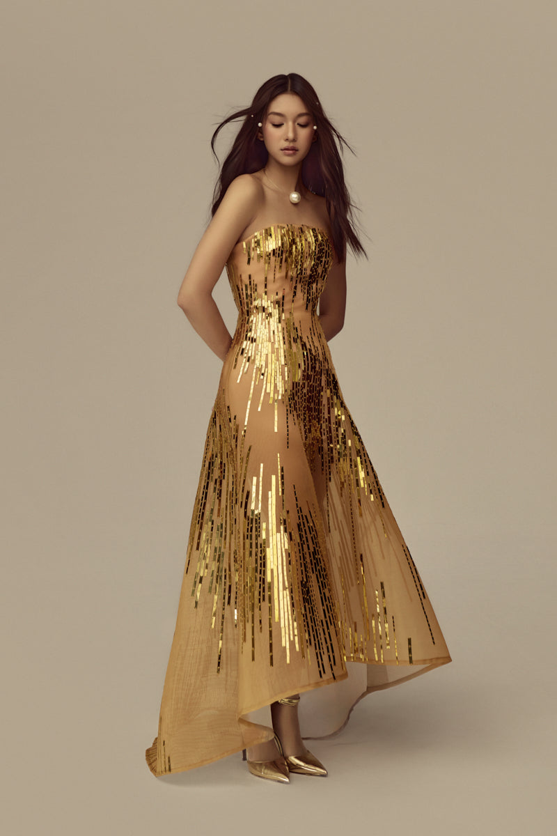 Elegant POEM AURIELLE gown in soft fabric with intricate detailing and flowing silhouette, perfect for formal occasions.