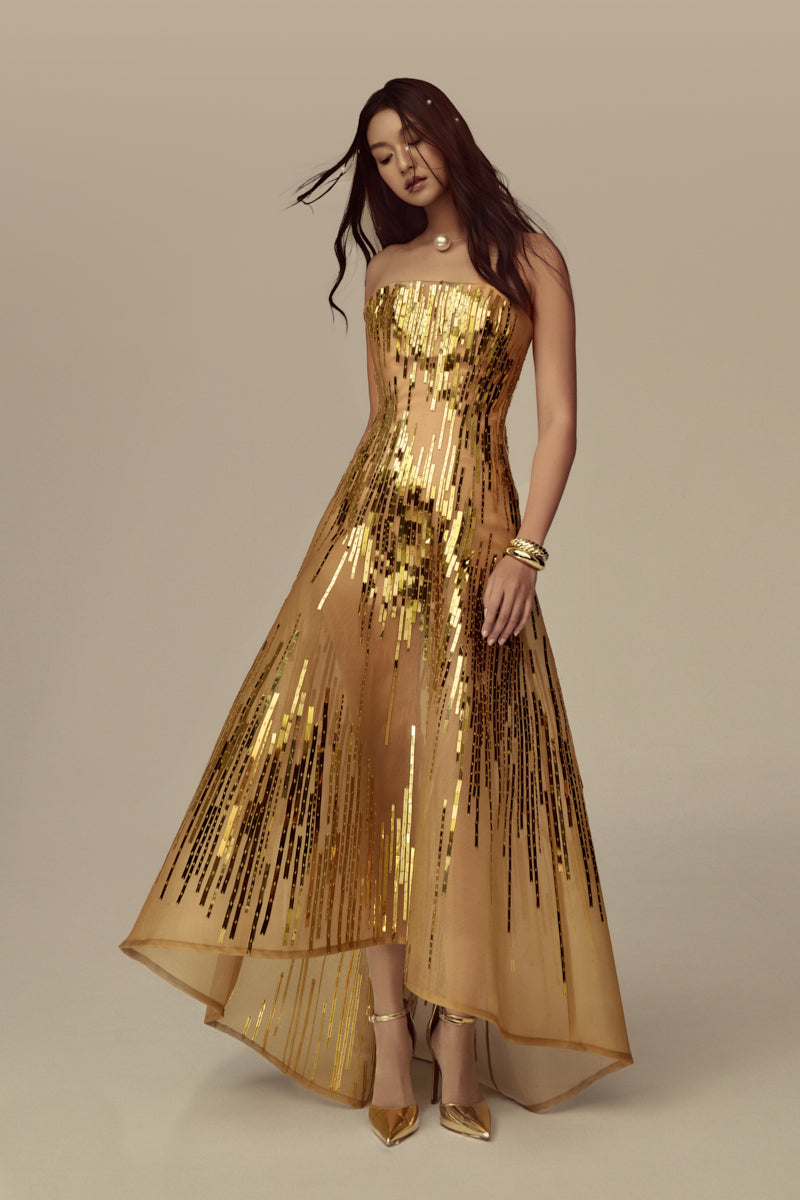 Poem AURIELLE midi dress with floral pattern, fitted waist, and flowing skirt, styled for a casual or semi-formal look.