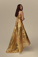 Elegant AURIELLE gown from POEM, featuring flowing fabric and intricate details, perfect for formal occasions.