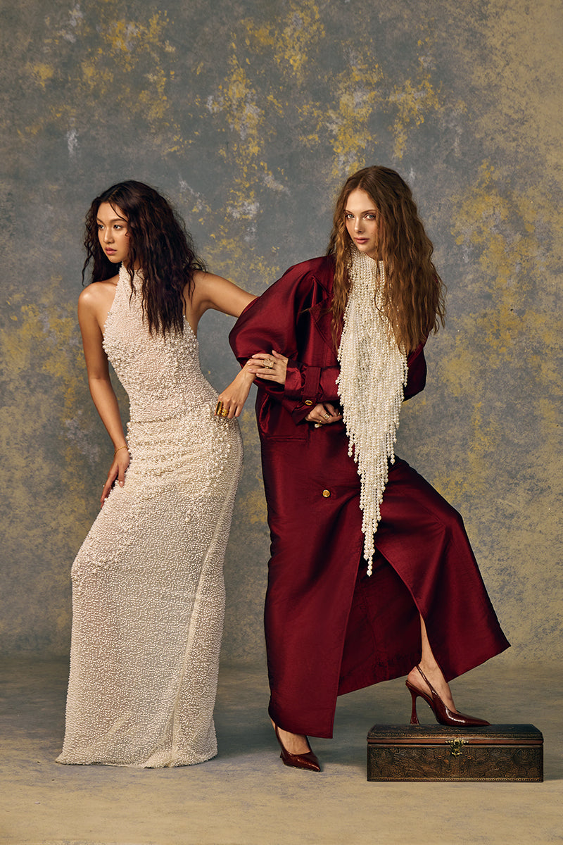 Elegant POEM Pearlescence Maxi Dress with flowing fabric and subtle sheen, perfect for formal occasions.