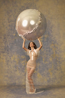 Elegant POEM Opaline Maxi Dress with flowing fabric and a stylish neckline, perfect for formal occasions.