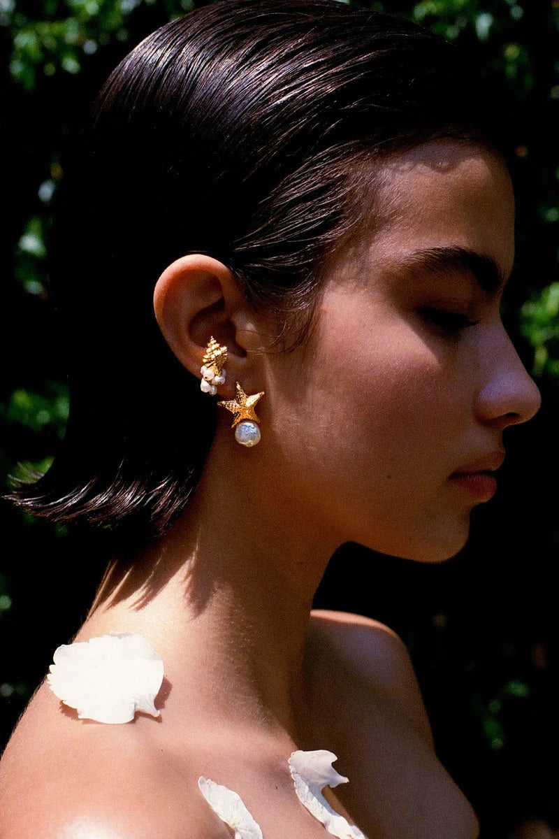 Peracas Positano ivory earrings featuring elegant design and lightweight style, perfect for adding a sophisticated touch.