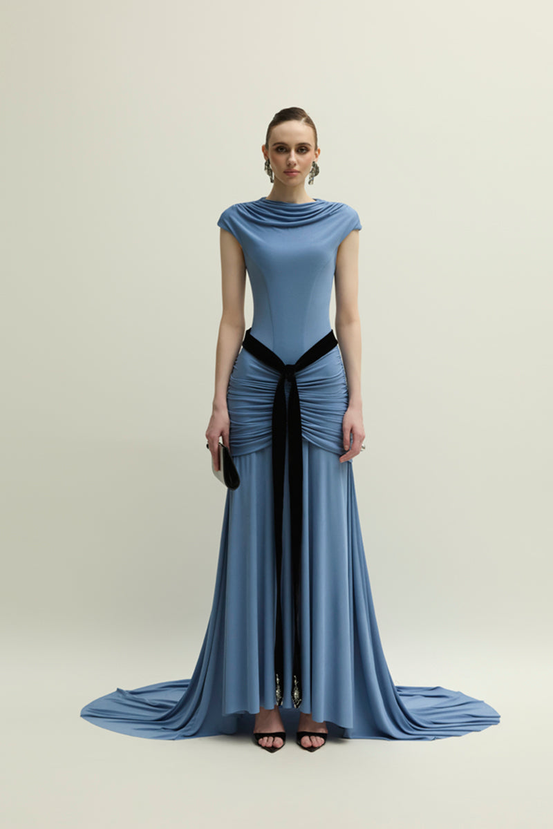 Jenny K Tran Primrose blue gown featuring elegant fabric and flowing design, perfect for formal occasions.