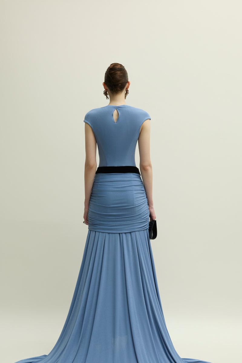 Jenny K Tran Primrose blue gown with flowing fabric and elegant design, perfect for formal occasions.