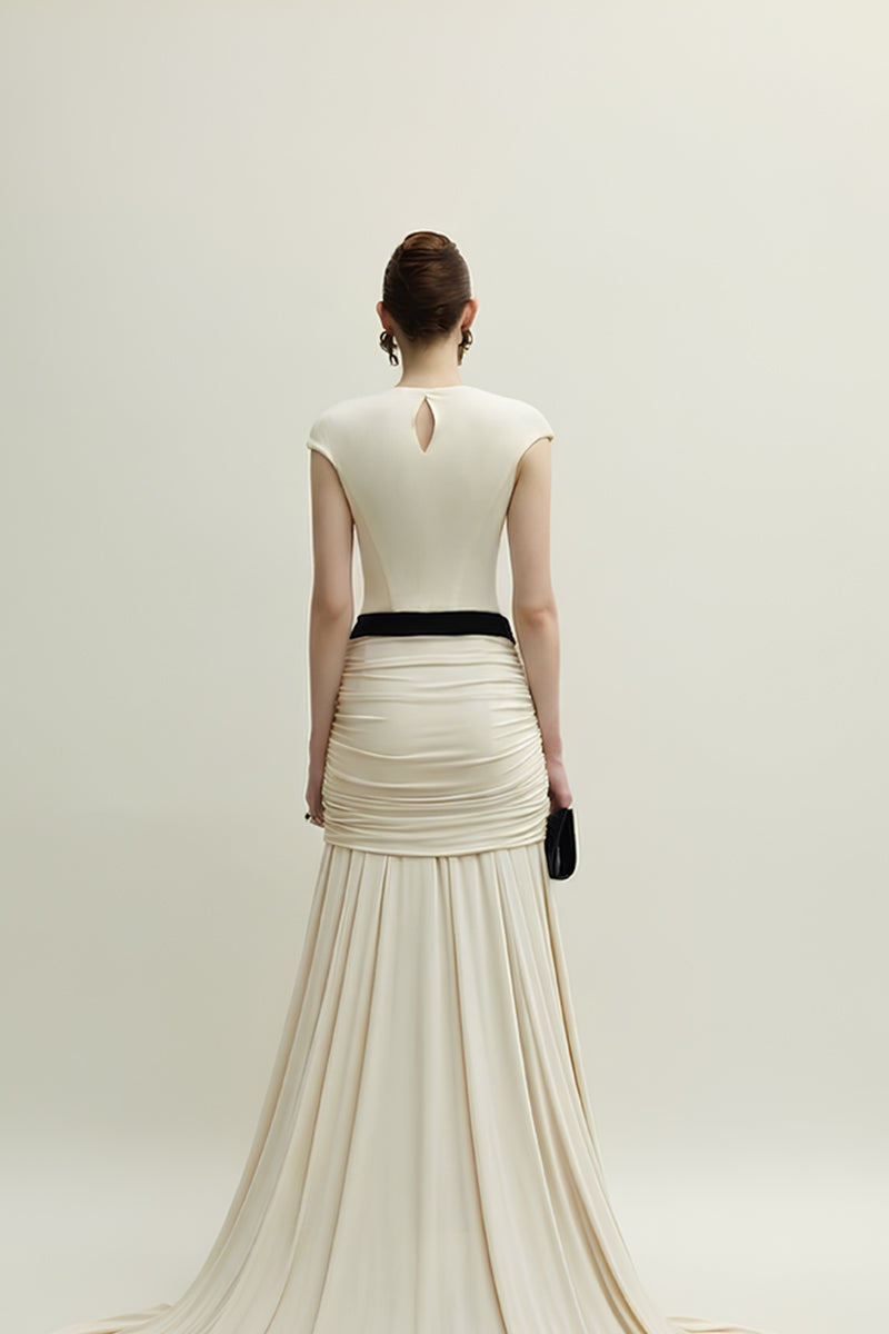 Jenny K Tran Primrose Ivory gown showing elegant fabric and detailed design for formal occasions.
