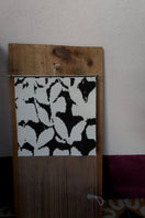 Black and white Clash of Prints shoulder bag by SAC DE SOUL featuring bold graphic patterns and structured design.