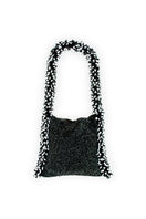 Black and white SAC DE SOUL Camila shoulder bag featuring a stylish mixed pattern and sleek design.