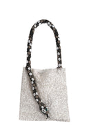 Serpent Big shoulder bag by Sac de Soul in white and silver with gray, white, and black accents, showcasing a stylish design.