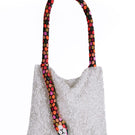Serpent Big shoulder bag by Sac de Soul in white silver with red, orange, and pink accents, featuring a sleek, modern design.