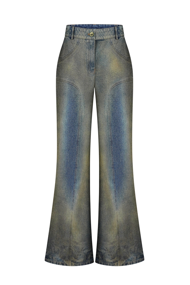 NADYA DZYAK flared jeans in rusty denim with a high waist and wide leg silhouette, front view showing detailed stitching.