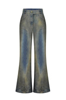 Nadya Dzyak flared jeans in rusty denim, front view showcasing high-waisted fit and wide flared leg style.