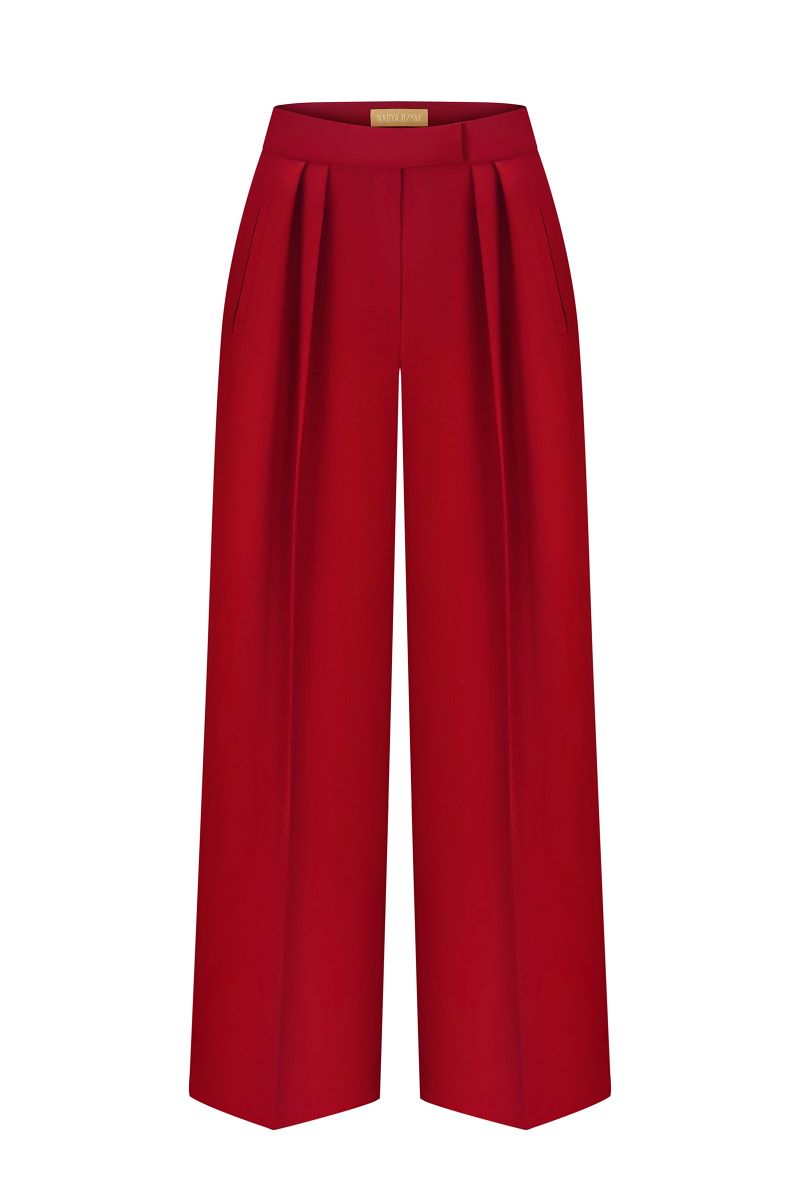 Red straight high-rise pants by NADYA DZYAK shown from the front, featuring a sleek fit and tailored waistband.