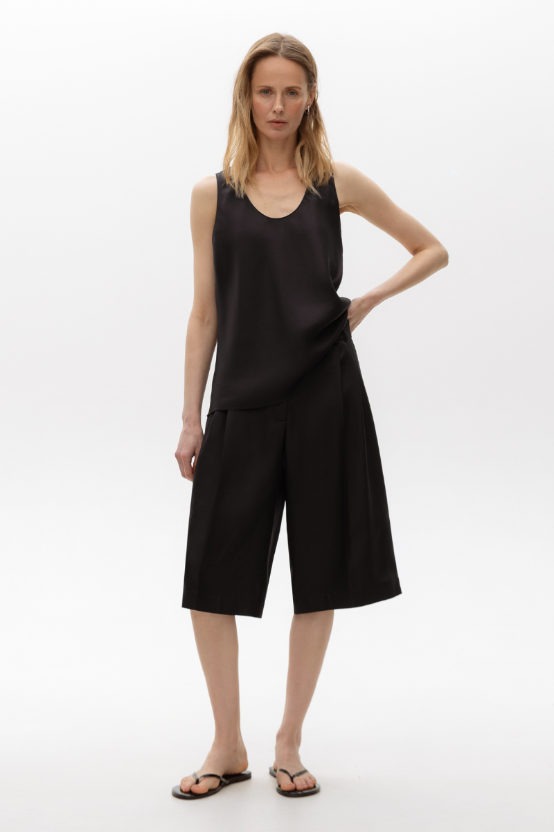 Serenity Paige black silk and wool blend shorts with a tailored fit, featuring a high waist and sleek design.