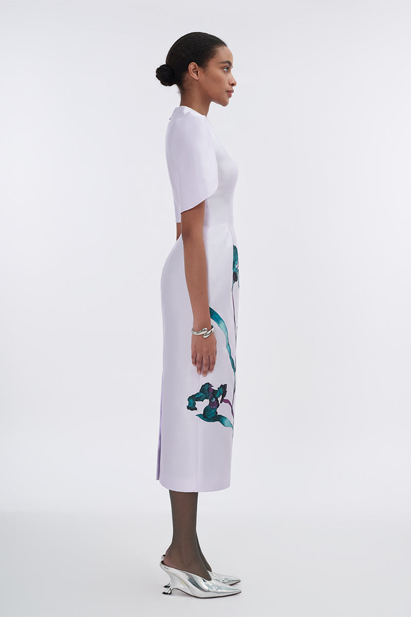 Pale lilac cape-sleeve pegged midi dress by Tiny Ink, featuring a flowing silhouette and elegant design.