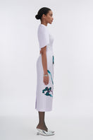 Pale lilac cape-sleeve pegged midi dress by Tiny Ink, featuring a flowing silhouette and elegant design.