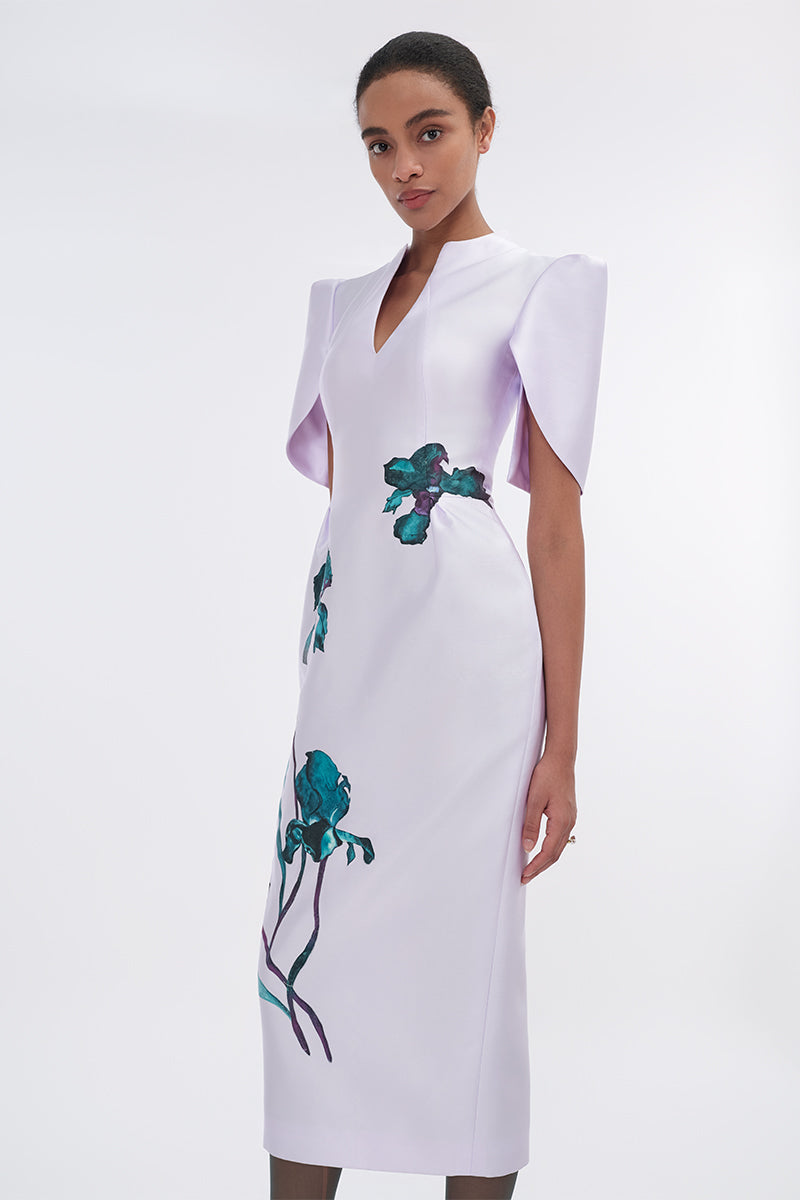 Pale lilac cape sleeve pegged midi dress by Tiny Ink, featuring a flowing design and elegant cape sleeves.