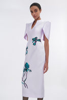 Pale lilac cape sleeve pegged midi dress by Tiny Ink, featuring a flowing design and elegant cape sleeves.