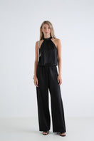 Serenity Palermo black silk-satin halter jumpsuit featuring a fitted bodice and wide-leg pants, stylish and elegant for evening wear.