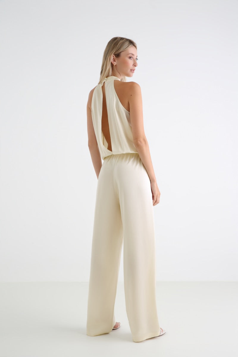 Serenity Palermo butter-cream silk-satin halter jumpsuit featuring a sleek design and elegant fit, perfect for stylish occasions.