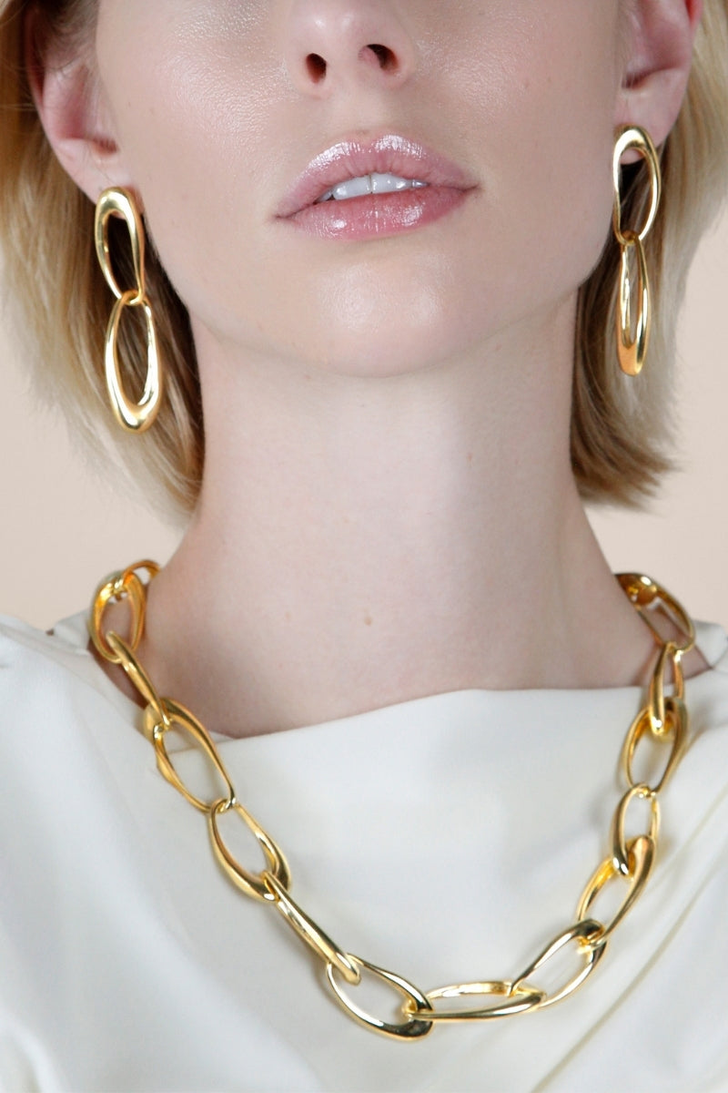 Sara Shala Palermo earrings in yellow gold vermeil displayed on a model, showcasing elegant, handcrafted jewelry.
