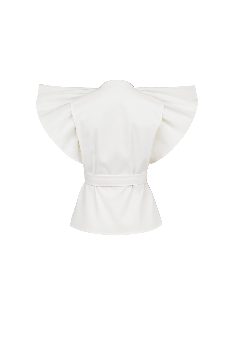 Ivory Palma blouse by ANA + MARIA, featuring a stylish top with delicate fabric and elegant design, shown on a mannequin.