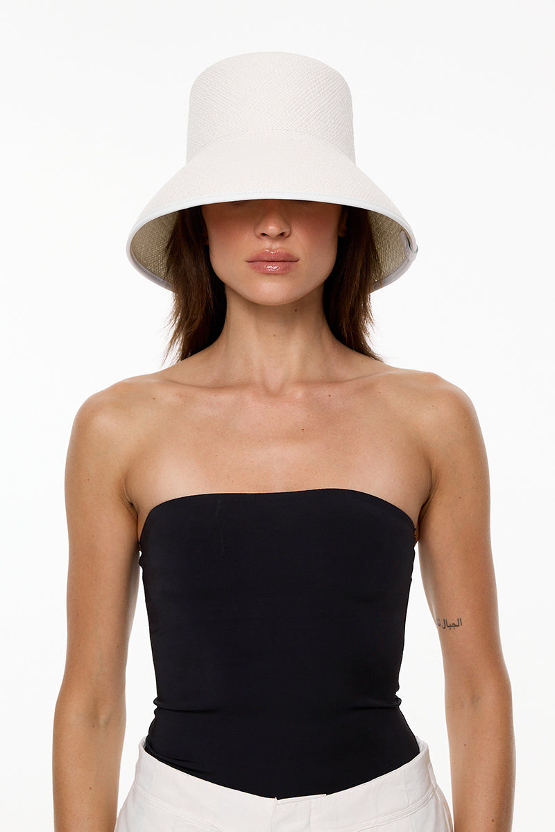 White Panama hat by LE SH KA with a wide brim, lightweight straw material, perfect for sun protection and stylish summer wear.