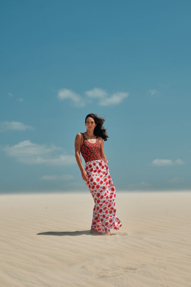 White poppy print Verdelimon pareo cover-up with lightweight, flowing fabric perfect for beach or poolside wear.