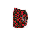 Black Poppy pareo mini cover-up by Verdelimon, shown front view, lightweight fabric with floral pattern perfect for beachwear.