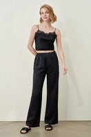Black Passion silk trousers for women by MANITO, stylish and elegant pants with a smooth silk fabric appearance.