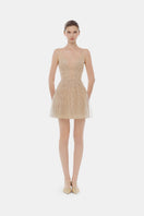 Light pink pastel deep V mini dress by Montsand, featuring a fitted silhouette and stylish neckline, perfect for warm-weather wear.