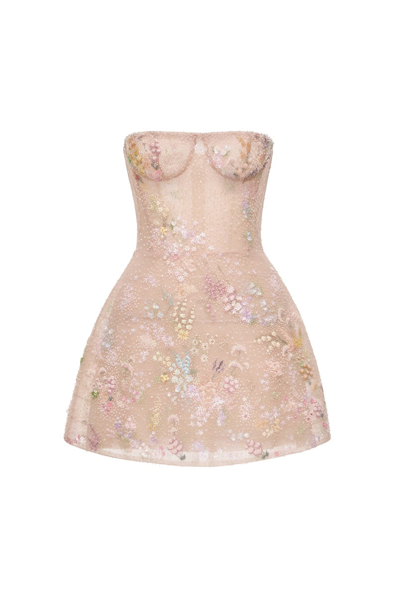 Pastel-colored mini dress by Montsand with floral embellishments, featuring a fitted bodice and short sleeves.