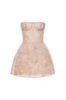Pastel flower embellished mini dress by Montsand, featuring a delicate floral design and feminine style for summer occasions.