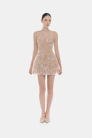 Pastel flower embellished mini dress by Montsand, featuring delicate floral details and a stylish, feminine design.